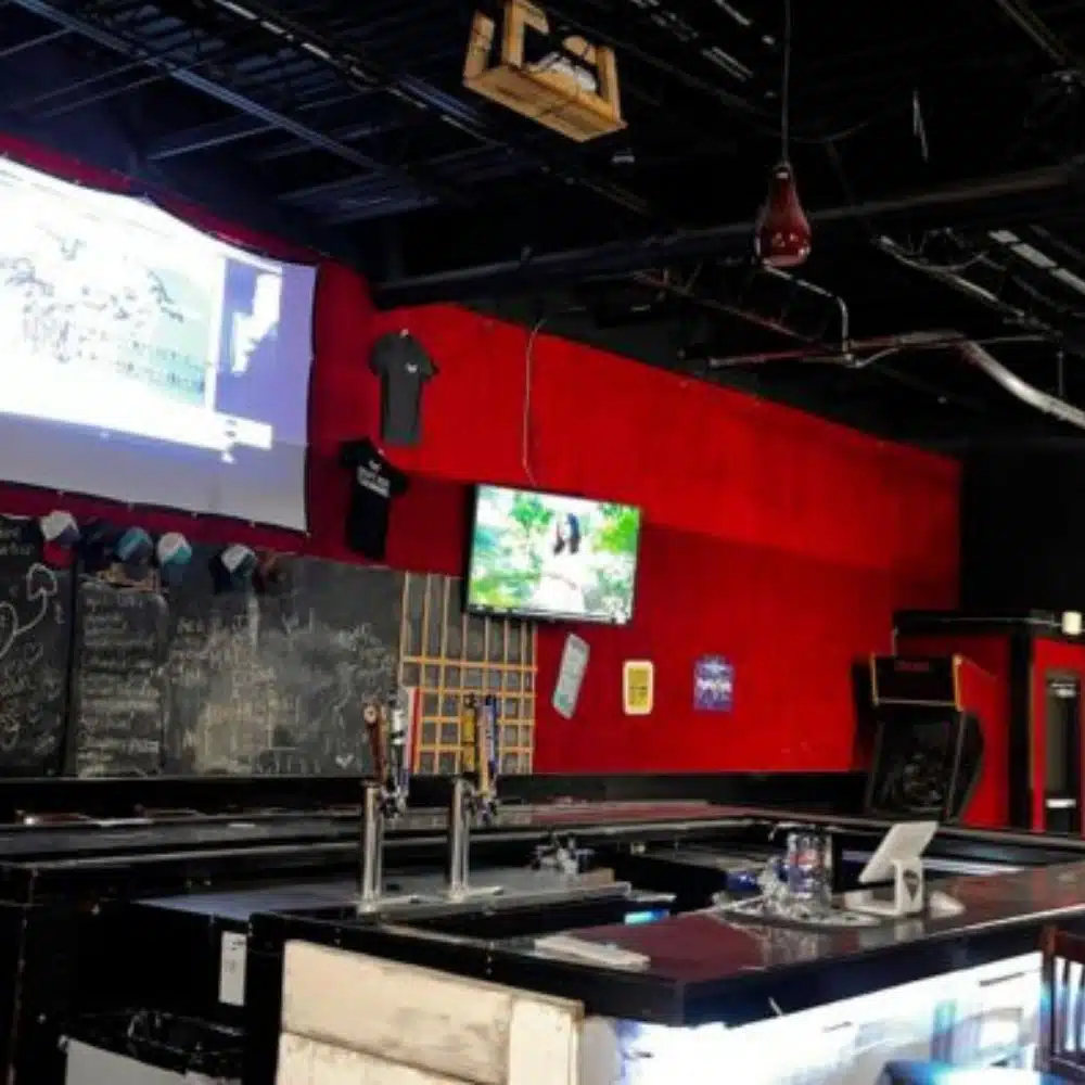Upstairs game area at Craft Axe Throwing Columbia with billiards and skeeball