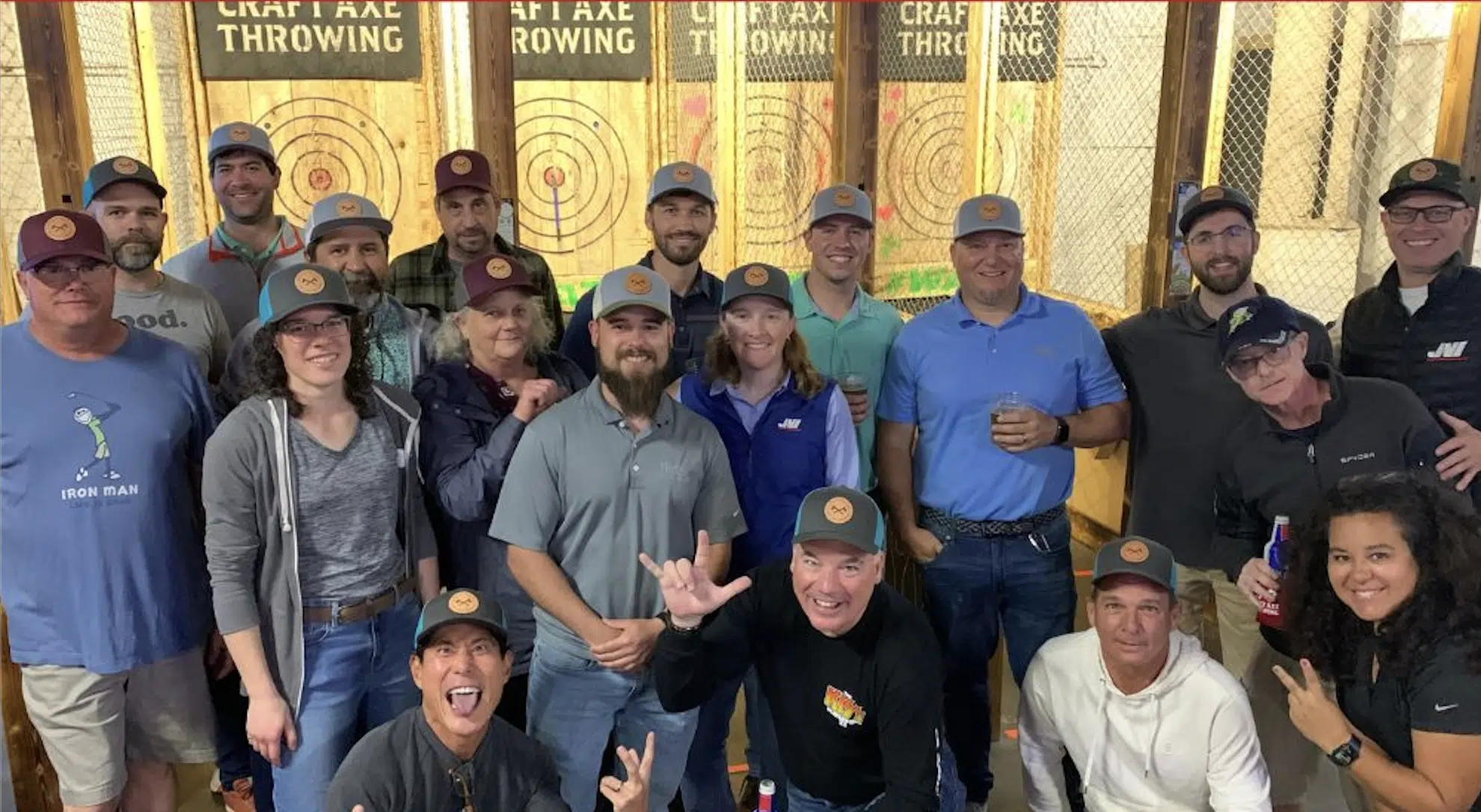 Large group posing together at a Craft Axe Throwing event